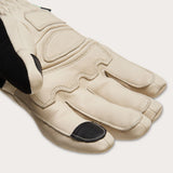 Peak Leather Glove-Pair of beige and black gloves with Oakley branding on a white background