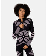 Faith1_2Zip-Woman wearing a black and gray patterned sweater on a white background