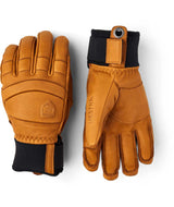 FallLine-Pair of brown leather gloves with black cuffs on a white background