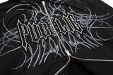 GeneralZipUp-Close-up of a black zip-up hoodie featuring a large white gothic-style 'PUBLIC' graphic and white sketch-style line art across the chest, with a silver zipper.