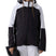 GirlsConquerJacket- Girl wearing a black and white ski jacket on a white background