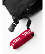 HeliMistralJr.Mitt-Black mitt on a white background
