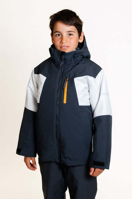 HydraBoysInsulatedJacket-A young boy wearing a dark navy and light gray color-blocked ski jacket with a bright yellow zipper, paired with matching dark pants, photographed against a clean white studio background.