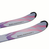 JR.LQSTCOSMICSKYSC5GW-Two Salomon skis with pink and purple camouflage pattern on a white background