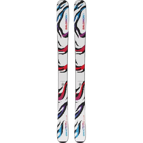 JR.QSTBLANKTEAM-A pair of Salomon skis shown vertically against a plain white background, featuring a white base with a colorful abstract pattern of black, red, purple, and blue.