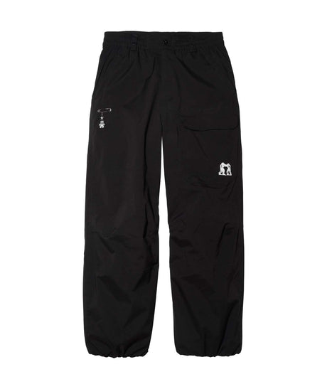 JibPant- Black pants with a small white logo on a white background