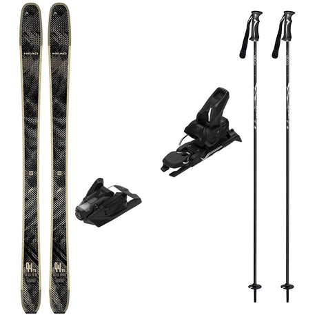 KORE94Tiw_Strive12-A ski gear set on a plain white background, including a pair of black and gray patterned skis, two black ski bindings, and two black ski poles with white graphics.