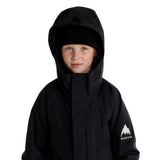 KPowlineGORE-TEX2LJacket-Child wearing a black hooded jacket with a visible brand logo on a white background