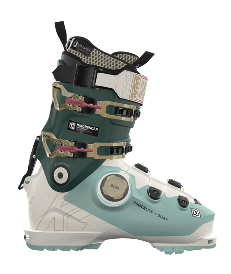 Mindbender105-Pair of green and white ski boots with visible brand logos on a transparent background