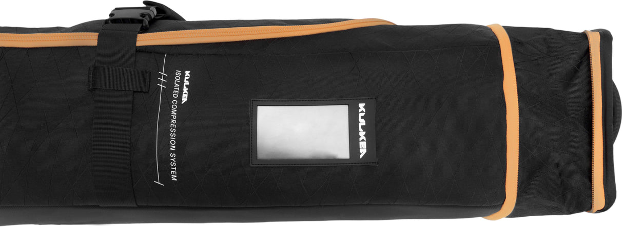 KantajaDoubleRollerSkiBag- Black and gold bag on a white background 