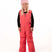 KidsHaileyBib- Child wearing pink snow bibs on a white background