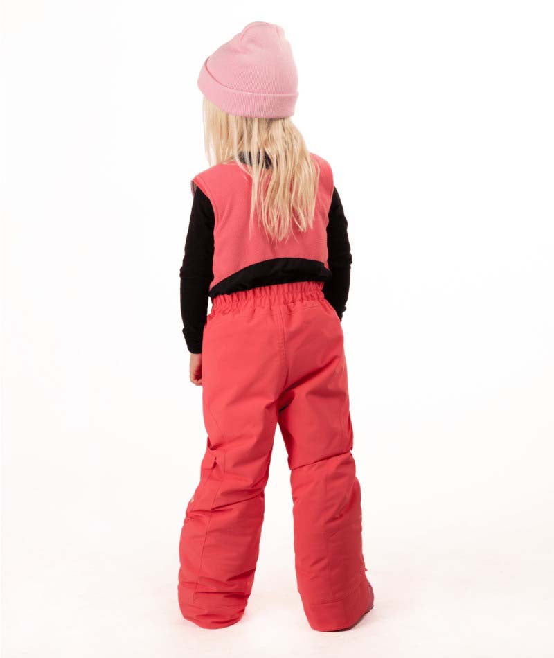 KidsHaileyBib- Child wearing pink snow bibs on a white background