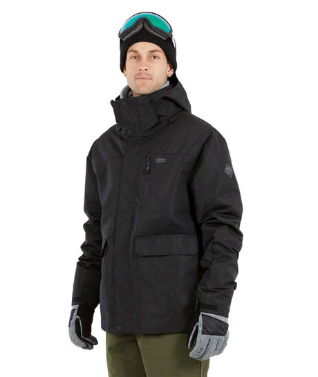 KnoxJacket-A man wearing a black snowboard jacket, black beanie with goggles, and gray gloves, standing against a solid white background.