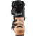 T2RT- A kid's Salomon T2 RT ski boot in beige with black straps and buckles, and a visible logo.