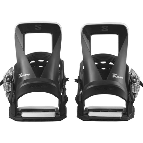 TheFuture-A kids' snowboard binding from Salomon, primarily black in color, with white and gray accents and branding.