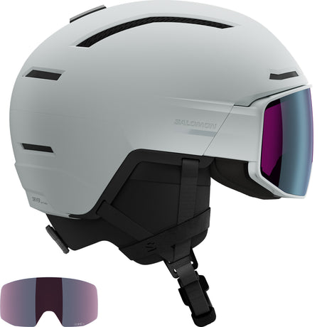 Driver Prime Sigma Plus MIPS Helmet- A light blue Salomon ski helmet with a visor, featuring a second lens in blue and purple colors.