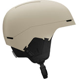 BrigadeIndexMIPS- Beige helmet with black chin strap on a white background