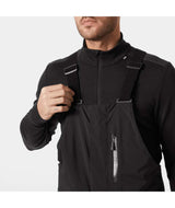 LegendaryInsulatedBibPant-Black bib overalls on a white background