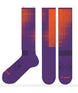 LightCushionPixelSnowSock-Purple and orange socks with geometric pattern on a white background