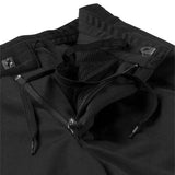LillehammerKidsPants-Black athletic pants with zippered side pockets and a white SWIX logo on the left thigh, shown against a plain white background.