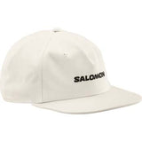 LogoFlatCap-White cap with 'Salomon' logo on a white background