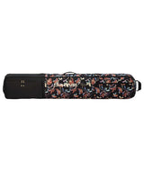 LowRollerSnowboardBag-Black floral patterned snowboard bag with Dakine logo on a white background