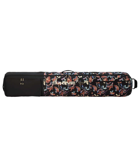 LowRollerSnowboardBag-Black floral patterned snowboard bag with Dakine logo on a white background