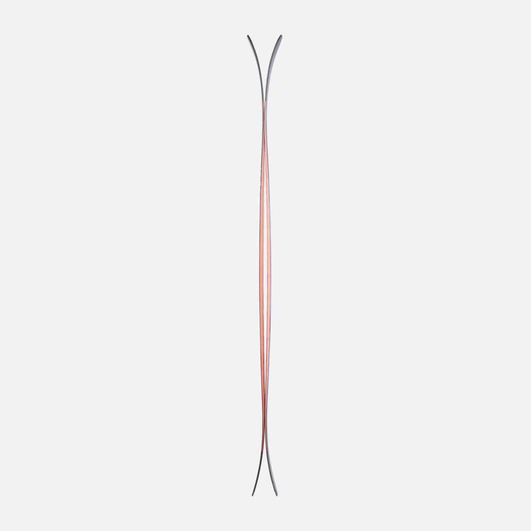 M-FREE100OPEN-A pair of Dynastar ski tips with a blue and black abstract pattern and red accents, displayed vertically against a light gray background.