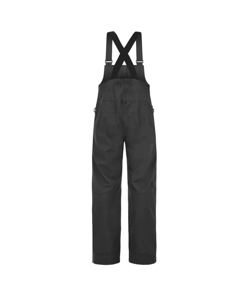 MAveningBibPant-Colorblock bib overalls in black and beige, featuring adjustable shoulder straps, a front button closure, and multiple utility pockets, shown against a plain white background.