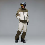 MCanopyProInsulatedJacket-A color-blocked hooded jacket with an olive green upper section, hood, and lower front panel, paired with off-white color-blocked sleeves and a lower front panel. It features a black front zipper, black drawstrings, and a small Oakley logo on the chest.