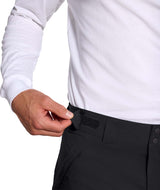 MChakalPant- Man wearing black snow pants with The North Face logo on a white background