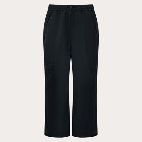 MChannelShellPant-Black wide-leg snow pants with an elastic drawstring waist and side pockets, shown on a light gray background.
