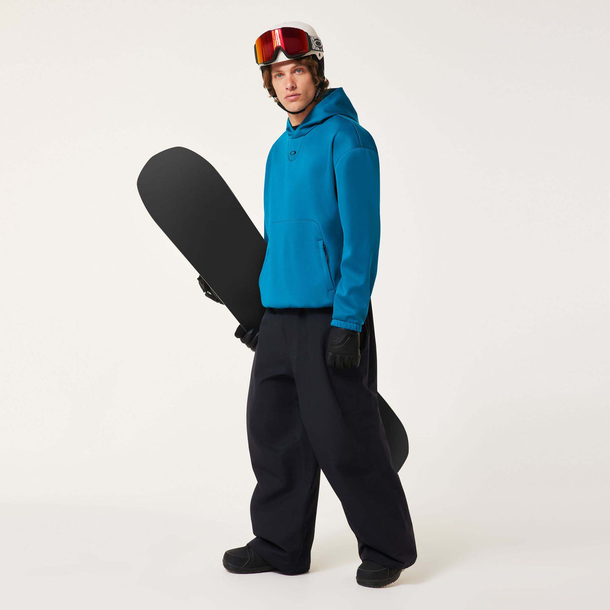 MChannelShellPant-Black wide-leg snow pants with an elastic drawstring waist and side pockets, shown on a light gray background.