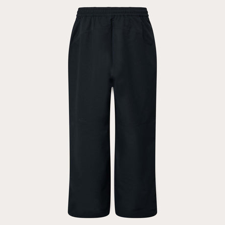 MChannelShellPant-Black wide-leg snow pants with an elastic drawstring waist and side pockets, shown on a light gray background.