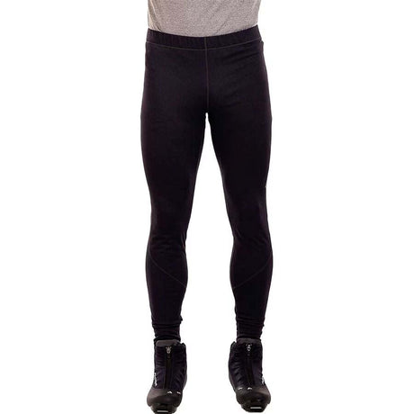 MDeldaSoftshellTight-Black full-length insulated leggings shown on a cropped lower-body mannequin or model, paired with black boots against a plain white background.