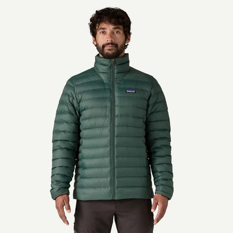 MDownSweaterJacket-Green puffer jacket with Patagonia logo on a white background