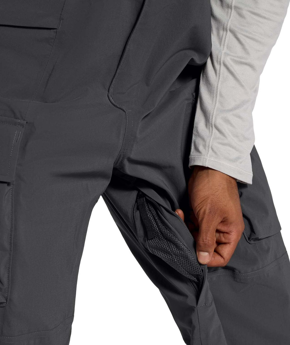 MFreedomBib- Man wearing grey bib overalls with The North Face logo on a white background