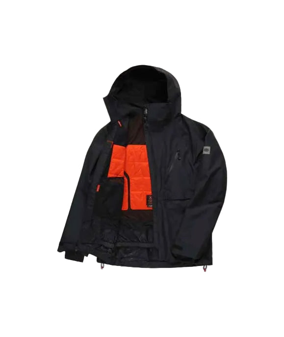 MHydraThermagraphJacket-A man wearing a black ski jacket with black zippers, black gloves, a cream neck gaiter, and a black beanie with goggles, photographed against a plain white background.