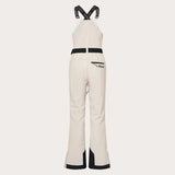 WTNPHarperSoftshellBib-White ski jumpsuit with a belt on a light gray background