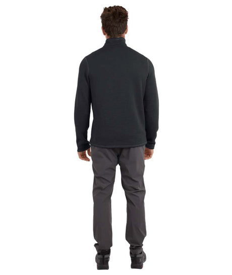 MMerinoAeroGridFleece-A man wearing a dark charcoal gray quarter-zip long-sleeve performance pullover and dark gray pants, standing against a solid white background.