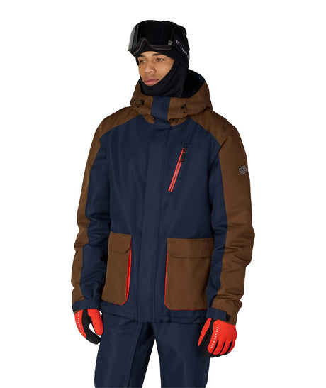 MNightlineInsulatedJacket-Person wearing a brown and navy jacket with red accents on a white background