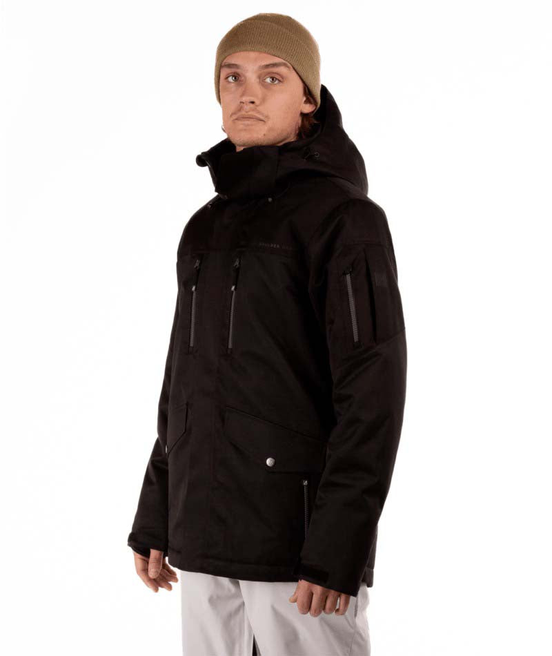 MQuestJacket-Person wearing a black jacket and beige beanie on a white background