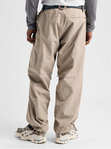 MReserve2LRelaxedPants-Beige pants with a brand logo on a white background