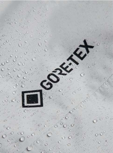MReserveGORE-TEX2LInsulatedJacket-Light gray jacket with black zippers on a white background