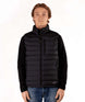 MSawyerPuffyVest-Man wearing a black puffer vest over a black shirt on a white background