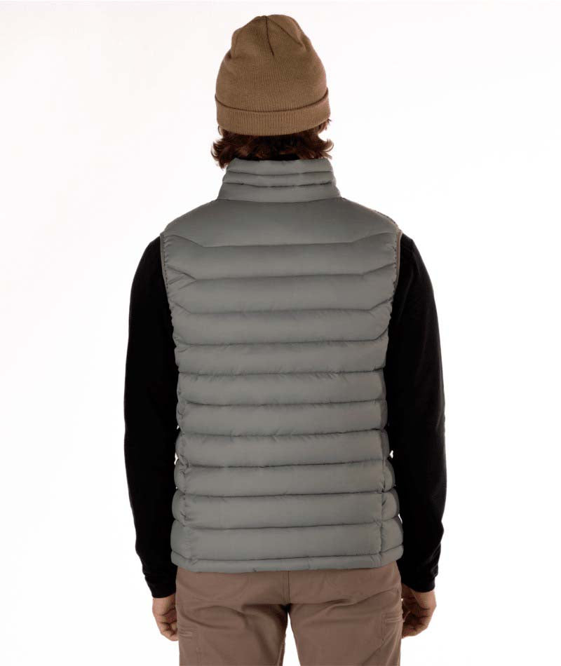 MSawyerPuffyVest-Man wearing a grey puffer vest over a black shirt on a white background