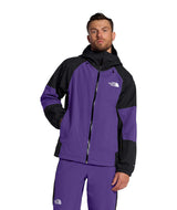 MSliderJacket-Man wearing a purple and black jacket with The North Face logo on a white background