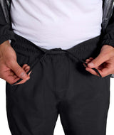MSliderPant-Black pants with a brand logo on a white background