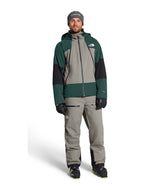 MSnowsquallJacket-Green and gray jacket with The North Face logo on a white background