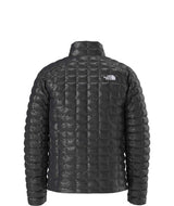MTHERMOBALLJacket-Black quilted jacket with The North Face logo on a white background